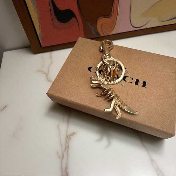 Coach Metallic Gold Dinosaur Key Holder - Picture 1 of 9